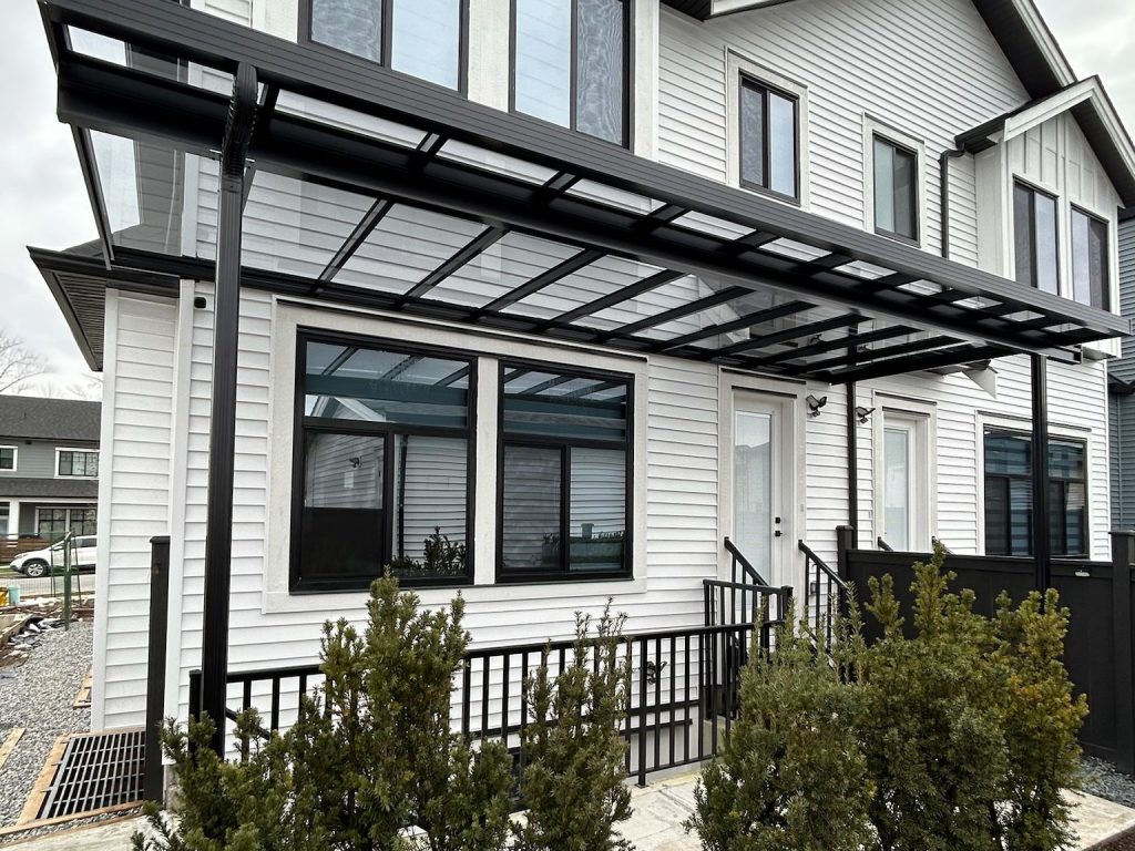 Modern aluminum pergola installed in backyard patio